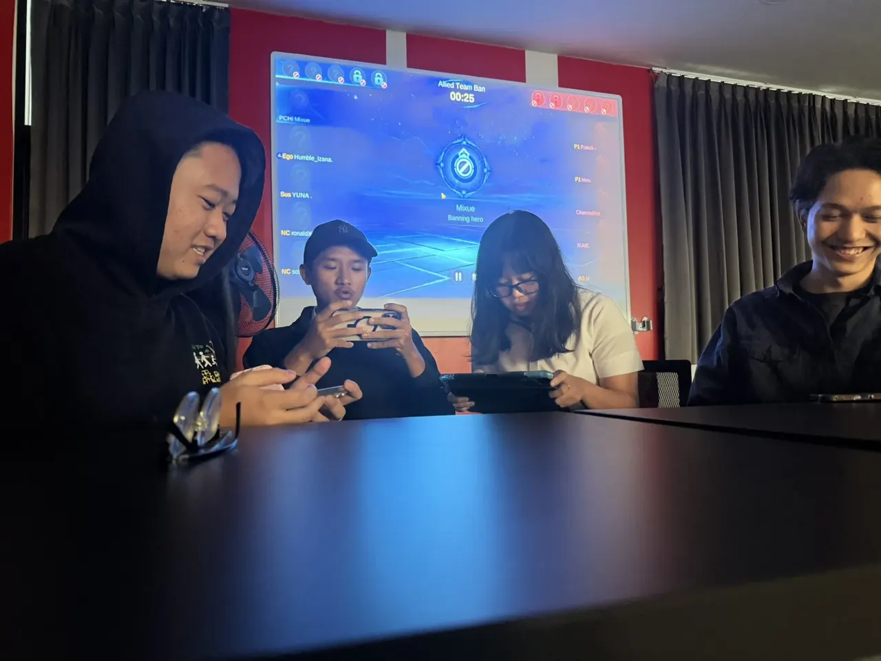 Students running a collegiate esports tournament